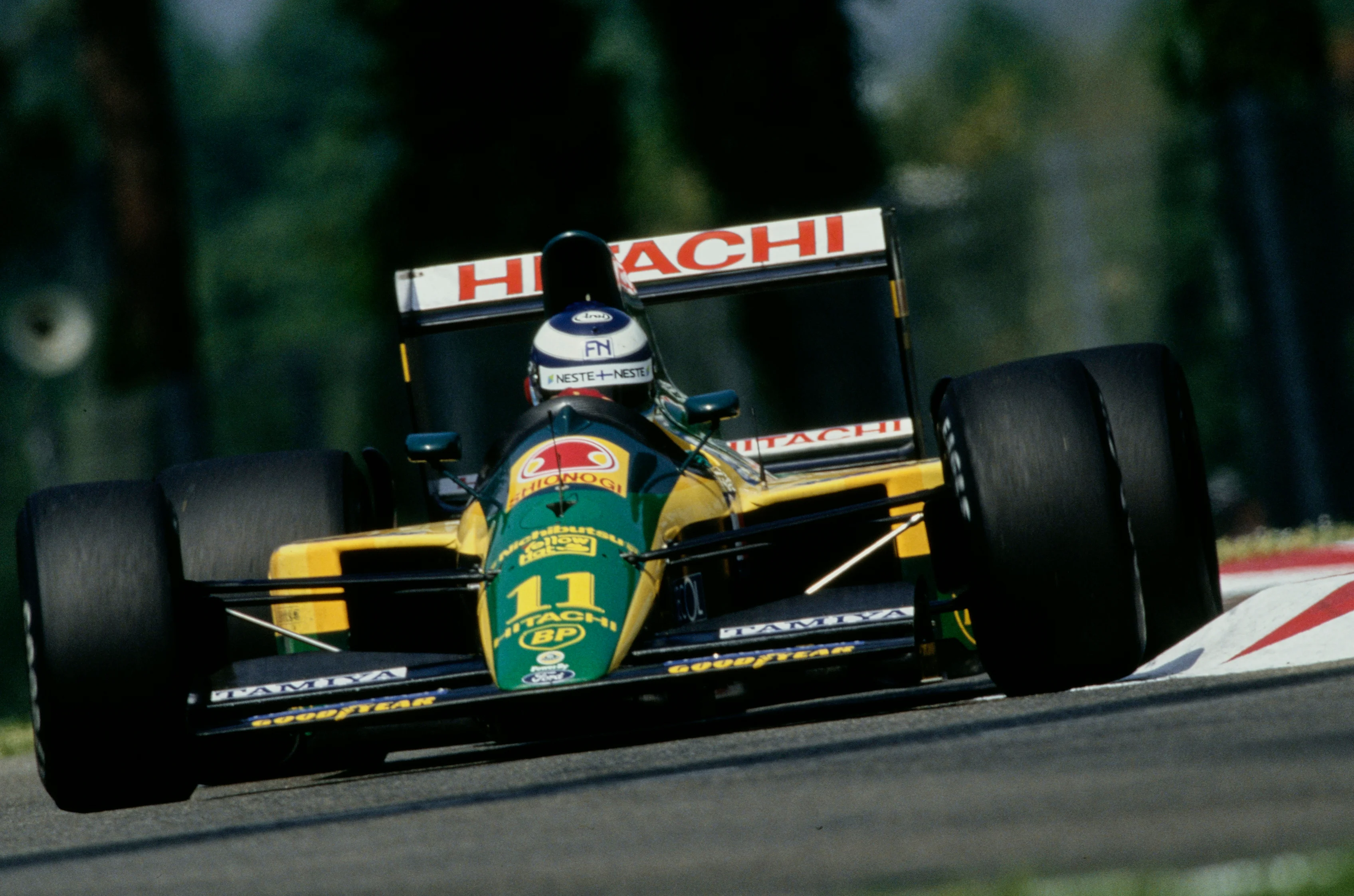 Mika Hakkinen from Finland drives the #11 Team Lotus Lotus 107 Ford V8 during practice for the